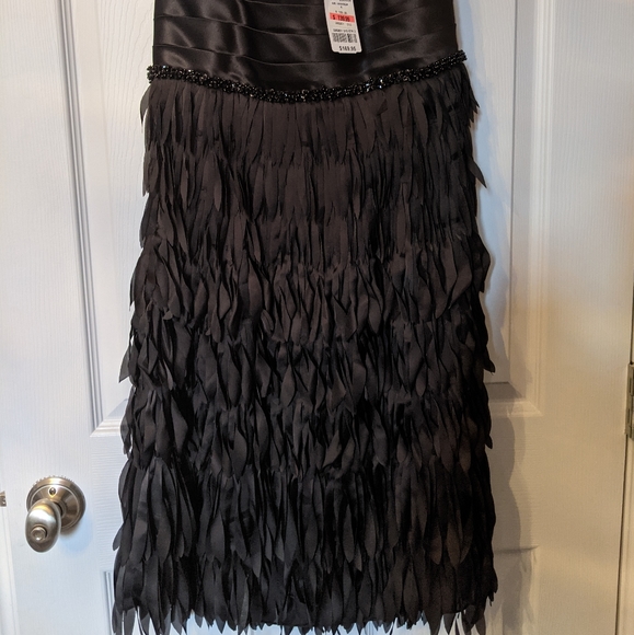 Brand new with tags beautiful feather look dress. - Picture 3 of 3